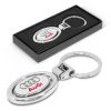 The Trends Spinning Metal Key Ring is an oval metal key ring with plated shiny chrome finish.  Presented in Black Gift Box.  Branding available on both sides.