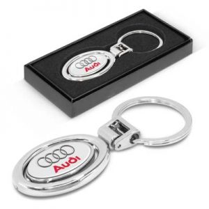 The Trends Spinning Metal Key Ring is an oval metal key ring with plated shiny chrome finish.  Presented in Black Gift Box.  Branding available on both sides.