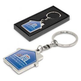 The Trends House Metal Key Ring is a shiny chrome metal key ring.  Shaped like a house.  Perfect for real estate and rental companies.