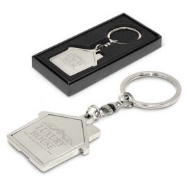 The Trends House Metal Key Ring is a shiny chrome metal key ring.  Shaped like a house.  Perfect for real estate and rental companies.