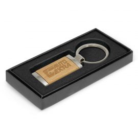 The Trends Albion Key Ring is a rectangular metal key ring with chrome finish and wood plate. Laser Engraved.  Branded key rings.