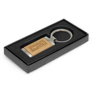112520 Trends Albion Key Ring - Promotrenz The Trends Albion Key Ring is a rectangular metal key ring with chrome finish and wood plate. Laser Engraved. Branded key rings.