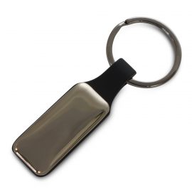 The Trends Collection Altos Key Ring is a rectangular, opulent, silicone and metal key ring.  Engraved or printed.  Gunmetal.  Great branded key rings for your clients.