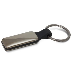 The Trends Collection Altos Key Ring is a rectangular, opulent, silicone and metal key ring. Engraved or printed. Gunmetal. Great branded key rings for your clients.