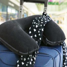 The TRENDS Comfort Neck Pillow is an inflatable neck pillow with soft touch velvet finish.  Black.  Great travel promo product.