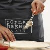 The TRENDS Westbury Waist Apron is a black waist apron made from 180gsm cotton twill.  Pocket on the front.  Multiple branding options.