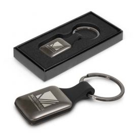 The Trends Altos Key Ring is a square, opulent, silicone and metal key ring.  Engraved.  Gunmetal.  Great branded key rings for your clients.