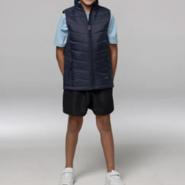 The Aussie Pacific Snowy Kids Vest is a nylon/polyester puffer vest. Sizes 4 - 16. Black or Navy. Great winter puffer vests.