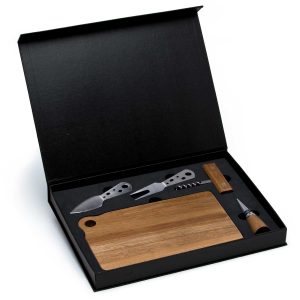 The Catalogue Apero Fromage Set is a 5 piece, acacia wood, cheese set. Includes a serving board, corkscrew, bottle stopper, a knife and fork.