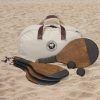 The Catalogue Backyard Paddle Tennis Set is an antique natural wood, 6-piece, paddle tennis set. Comes with a canvas bag.