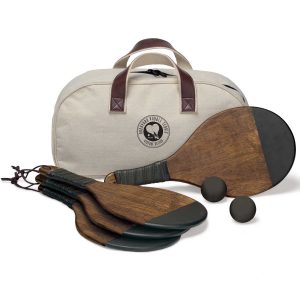 The Catalogue Backyard Paddle Tennis Set is an antique natural wood, 6-piece, paddle tennis set. Comes with a canvas bag.