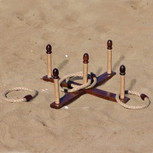 backyard-quoits-set-lifestyle-2 The Catalogue Backyard Quoits Set is an 11 piece, antique natural wood quoits set. Includes running boards, stakes and rope rings.