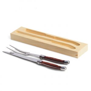 The Catalogue Bordeaux Carving Set is a stainless steel/wood set in a pine gift box. Includes carving knife and fork.