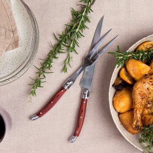 The Catalogue Bordeaux Carving Set is a stainless steel/wood set in a pine gift box. Includes carving knife and fork.