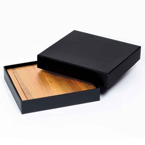 The Catalogue Clamshell Cheese Board is an Acacia hardwood board with 4 utensils. Includes 3 knives and 1 fork.