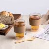 The Catalogue Kafe Double Walled Glass Set is a set of 2 double walled coffee and tea glasses. Bamboo teaspoons included.