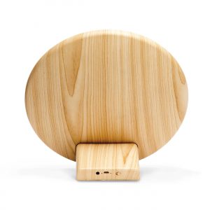 The Catalogue Lounge Disc Bluetooth Speaker is a wireless speaker with a fabric face. USB charging cable included.