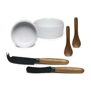 The Catalogue Meze Gourmet Set is a 7 piece acacia set. Includes a serving board, knives, spoons and ceramic bowls. Each piece has unique wood grain.