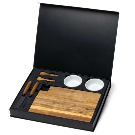 The Catalogue Meze Gourmet Set is a 7 piece acacia set. Includes a serving board, knives, spoons and ceramic bowls. Each piece has unique wood grain.