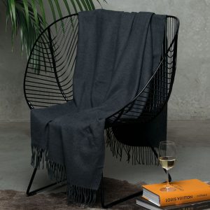 mt-lodge-merino-blanket-lifestyle The Catalogue Mt Lodge Merino Blanket is a 100% merino wool blanket with a herringbone weave. Brushed for a luxury feel.