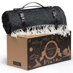 The Catalogue Ombrello Picnic Blanket is a 100% acrylic fabric, polyester backed blanket. Centred hole for umbrella.