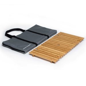 The Catalogue Ombrello Tavolo Table is an alfresco, foldable bamboo table with wine glass holders. Pack away into the included carry bag.