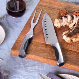 The Catalogue Carving Set is a 3 piece carving set. Stainless steel. Includes a knife, fork and sharpener. Comes in a gift box.