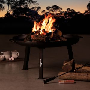 The Catalogue Roadhouse Fire Pit is a high carbon steel fire pit. Side handles with 3 legs. Includes a charcoal rake.