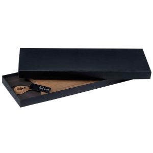 The Catalogue Serving Board is an acacia hardwood board with a bevelled handle. Leather loop for hanging. Each board is unique.