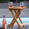 The Catalogue Tavolo Table is a foldable, bamboo table with integrated wine glass holders. Packs away into a carry bag with shoulder strap.