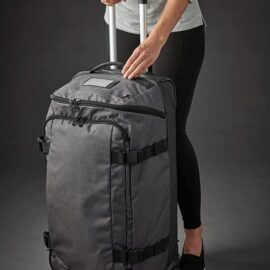 The Stormtech Equinox Rolling Duffel Bag is a polyester, hard-wearing, wheeled bag. Multiple compartments. Available in 2 colours.