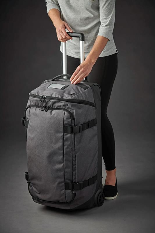The Stormtech Equinox Rolling Duffel Bag is a polyester, hard-wearing, wheeled bag. Multiple compartments. Available in 2 colours.