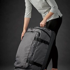 The Stormtech Equinox Rolling Duffel Bag is a polyester, hard-wearing, wheeled bag. Multiple compartments. Available in 2 colours.