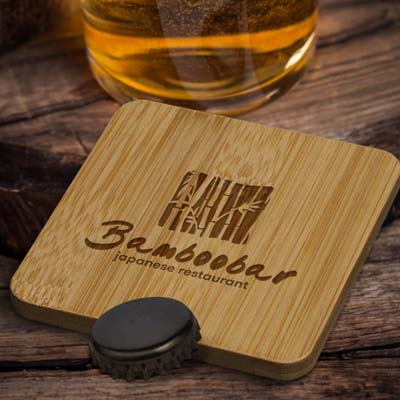 The TRENDS Bamboo Bottle Opener Coaster is a natural bamboo coaster with built in bottle opener.  Print or engraved logo available.  