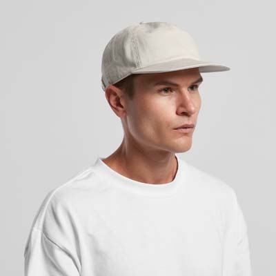 The AS Colour Class Five Panel Cap is a lightweight, mid profile cap.  100% cotton.  Flat peak..  Tear out label.  4 colours available.