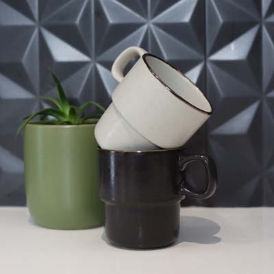 The Keepsake Stackable Coffee Cups are a set of 2 rustic 350ml stackable ceramic mugs.  Have your logo printed on the cups for your client gifts and retail stock.