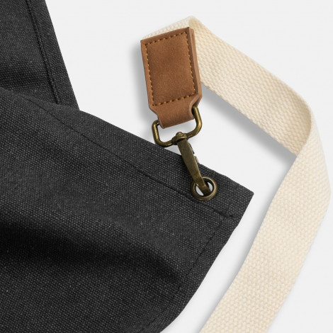 The Keepsake Canvas Apron is a 300gsm cotton canvas apron.  Washed Black finish.  Leather look front pocket.  Great option for cooking and kitchen related gifts. 
